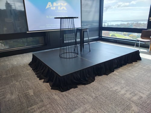 Our black stage hired with the table on it