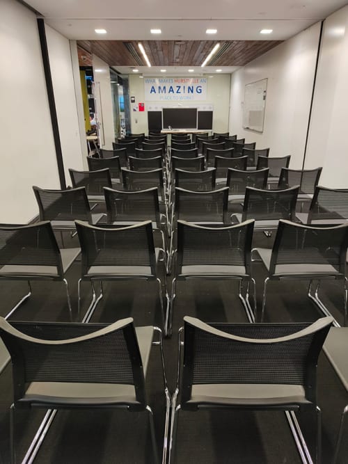 Lots of black conference chairs hired for a conference