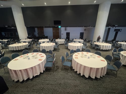 Chairs and tables all set up ready for a function