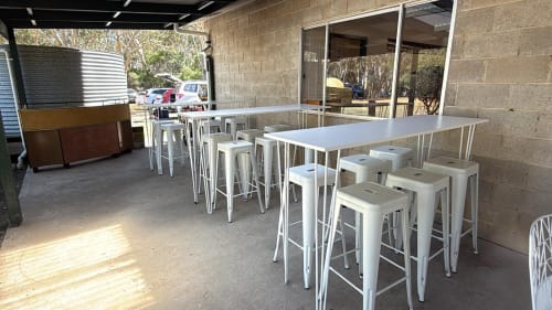 Our white wire tables with white Tolix stools