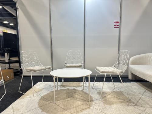 Our white wire chairs with a white coffee table