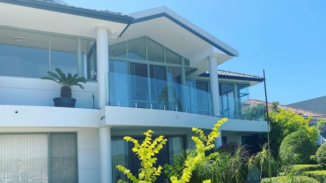 Curved laminated glass panels Tamara used for some residential balustrades