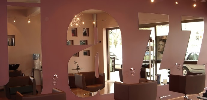 Custom commercial mirror in a hairdresser