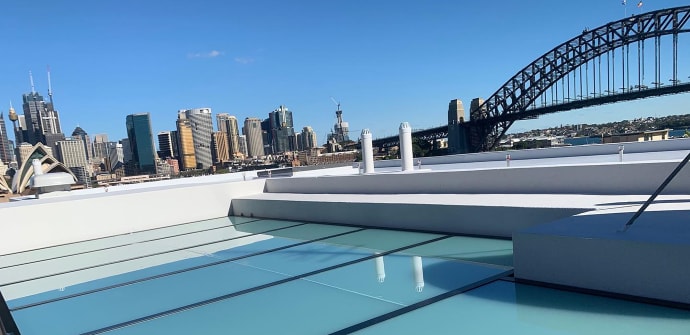 Newly installed glass roof on a business near the Sydney Harbour Bridge