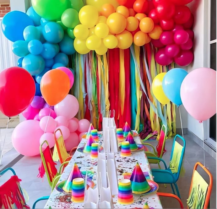 A colorful birthday party with balloons and decorations.