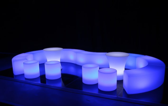 A set of blue led stools and tables.