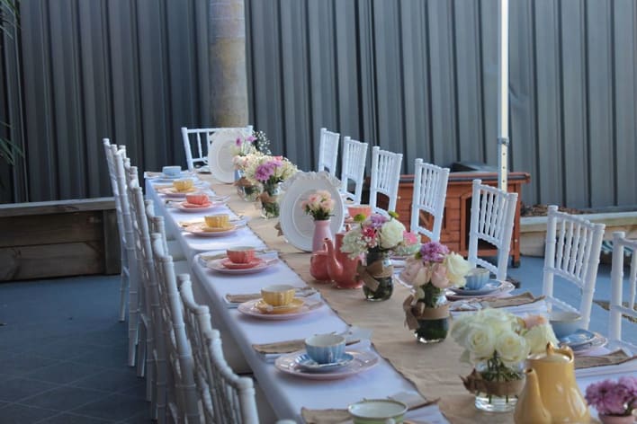 A table set up for a tea party.