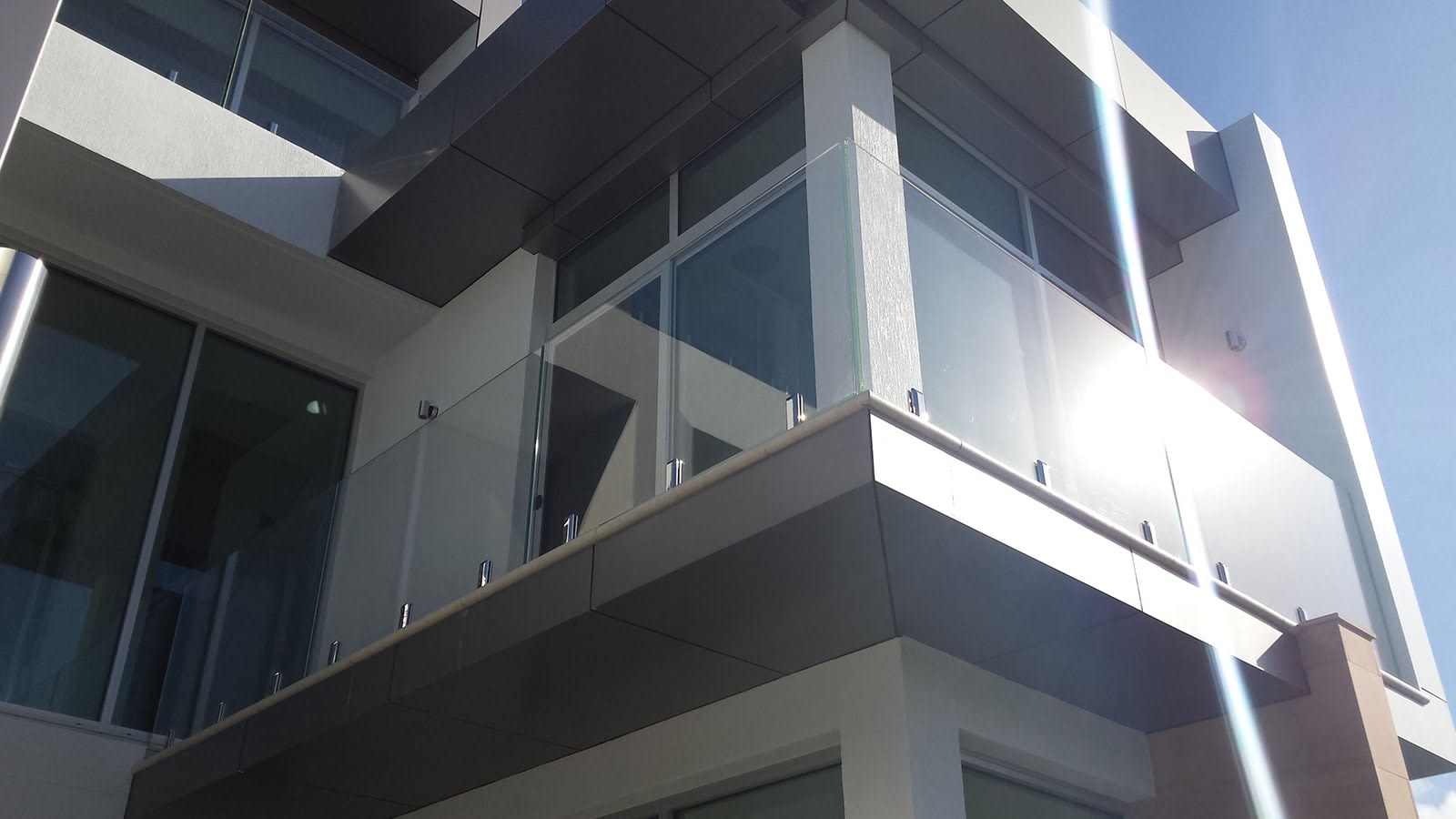Palmers GLASS BALUSTRADES SYDNEY. Balconies, Pool Fencing