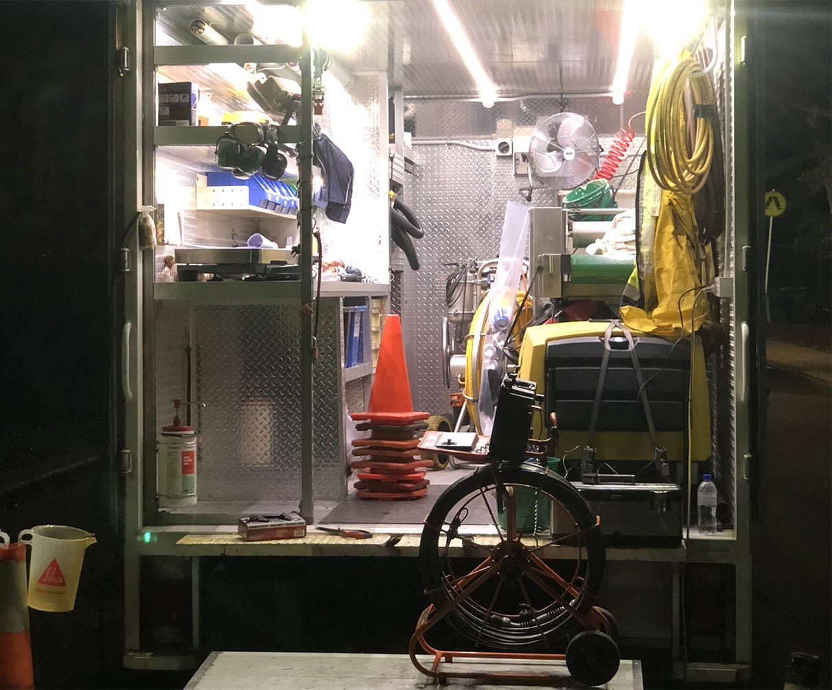 Our emergency plumbing van lit up on night on a job