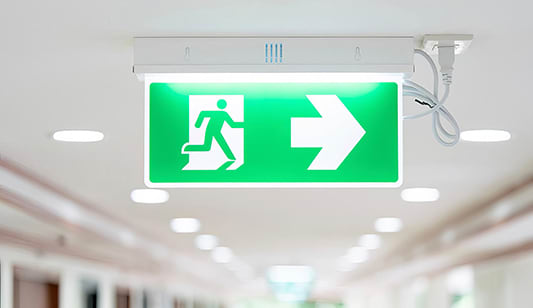 An emergency exit sign in an office