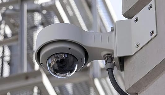 Commercial security camera installation on a factory