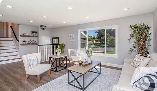 A lounge room with new downlights