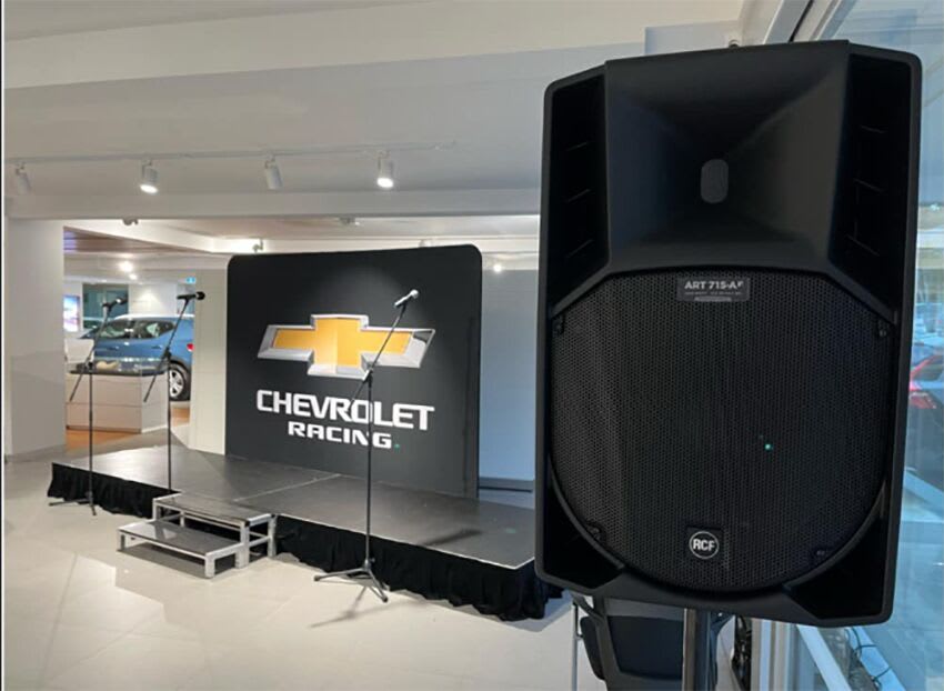 A Chevrolet speaker is on display in a showroom.