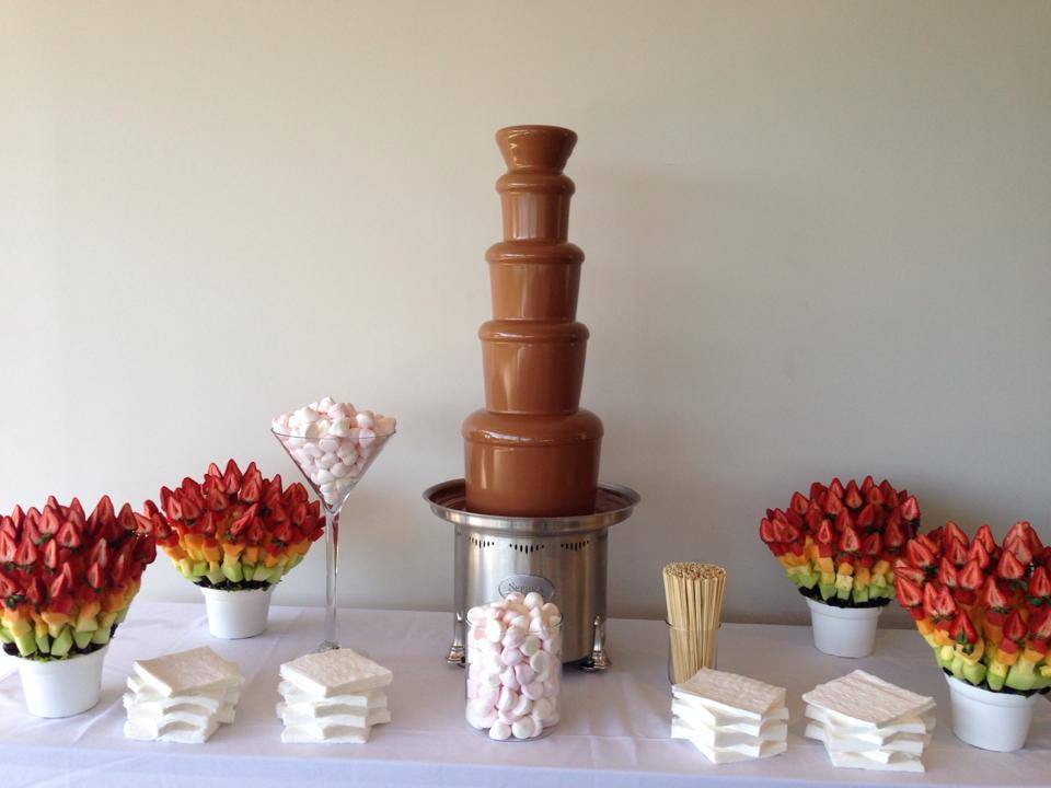 A chocolate fountain featuring delightful marshmallows.
