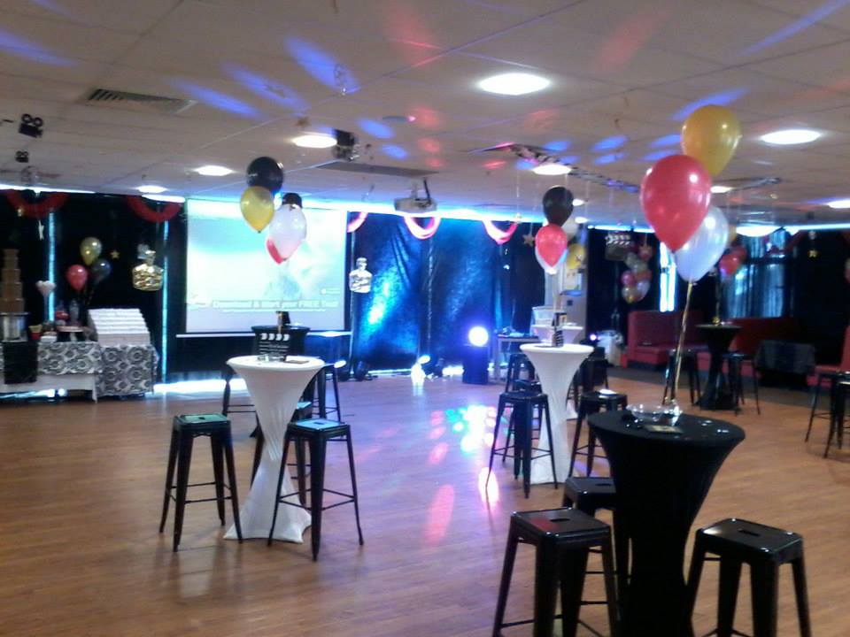 A party room with tables and our white Lycra socks