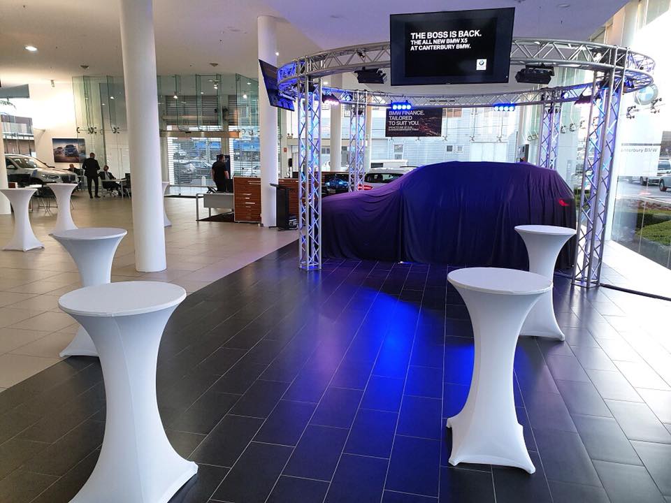 Our white lycra socks being used in a car dealership