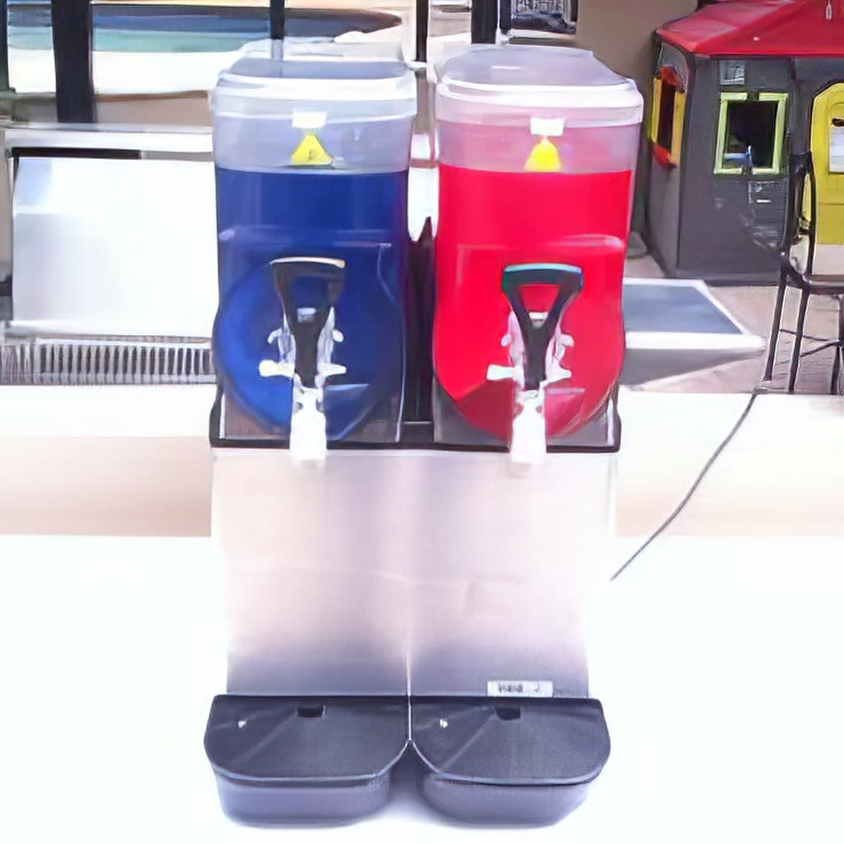 Slushie Machine Package 2 with 120 Drinks: Two soda dispensers sitting on top of each other.