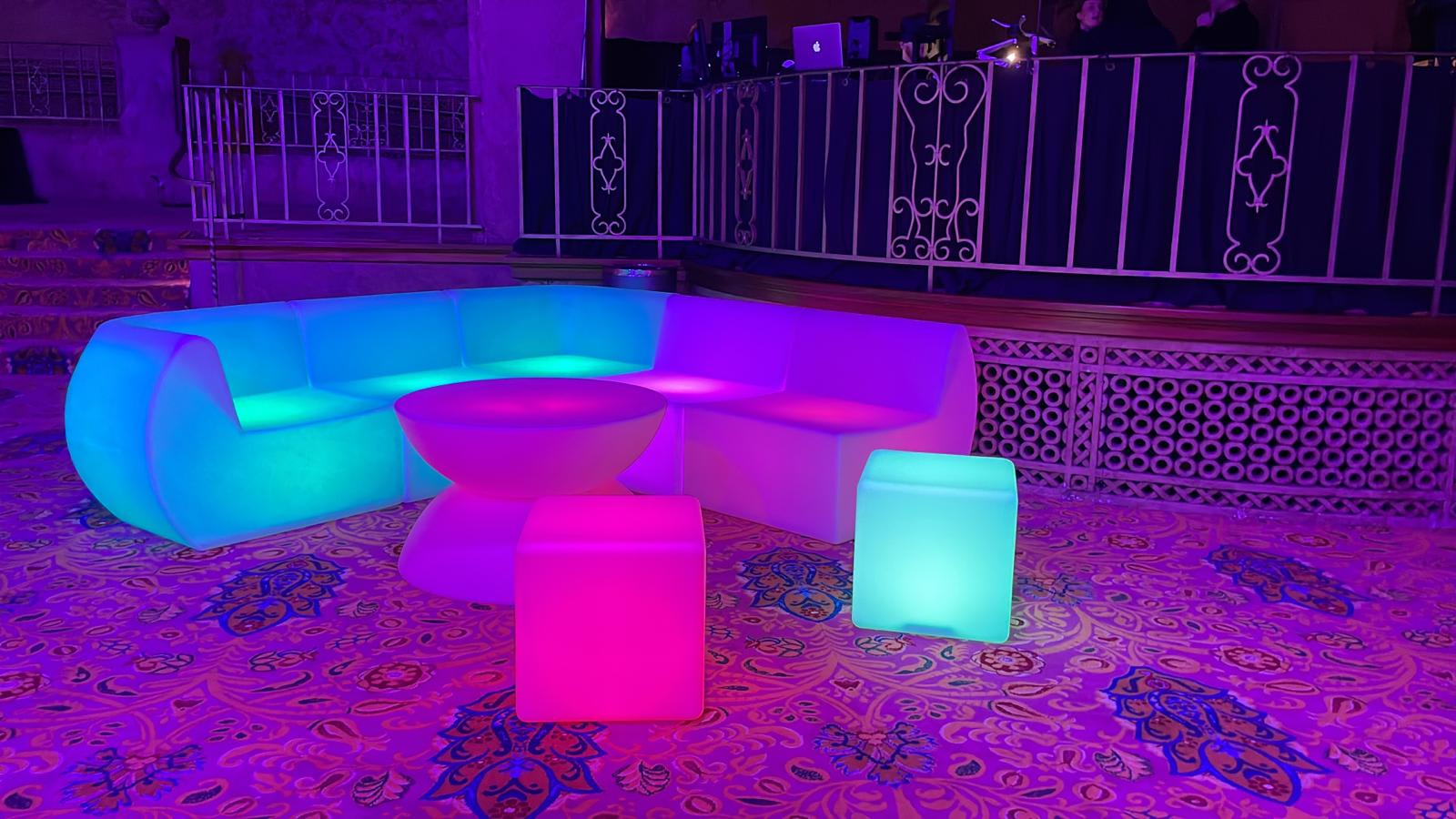 A colorful Glow Lounge Suite Hire in a room.