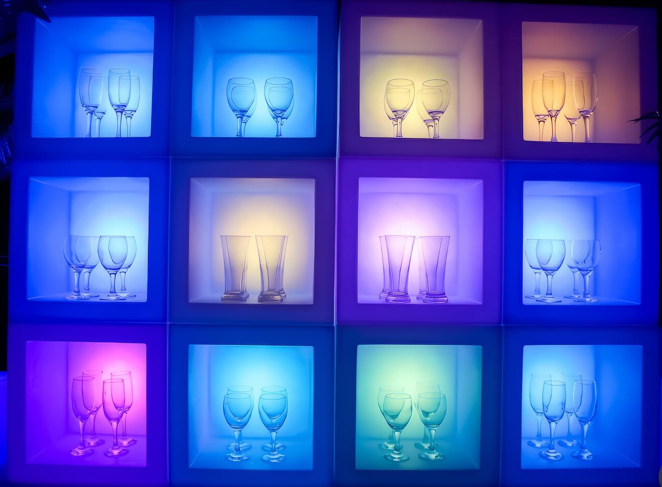 A set of Glow cubes with wine glasses in them available for Open Cube Hire.