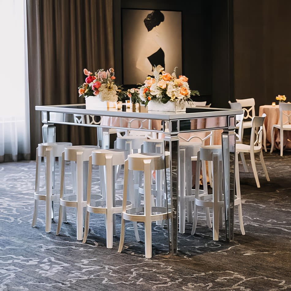 A room with ivory ghost stools hired from Party Hire Group