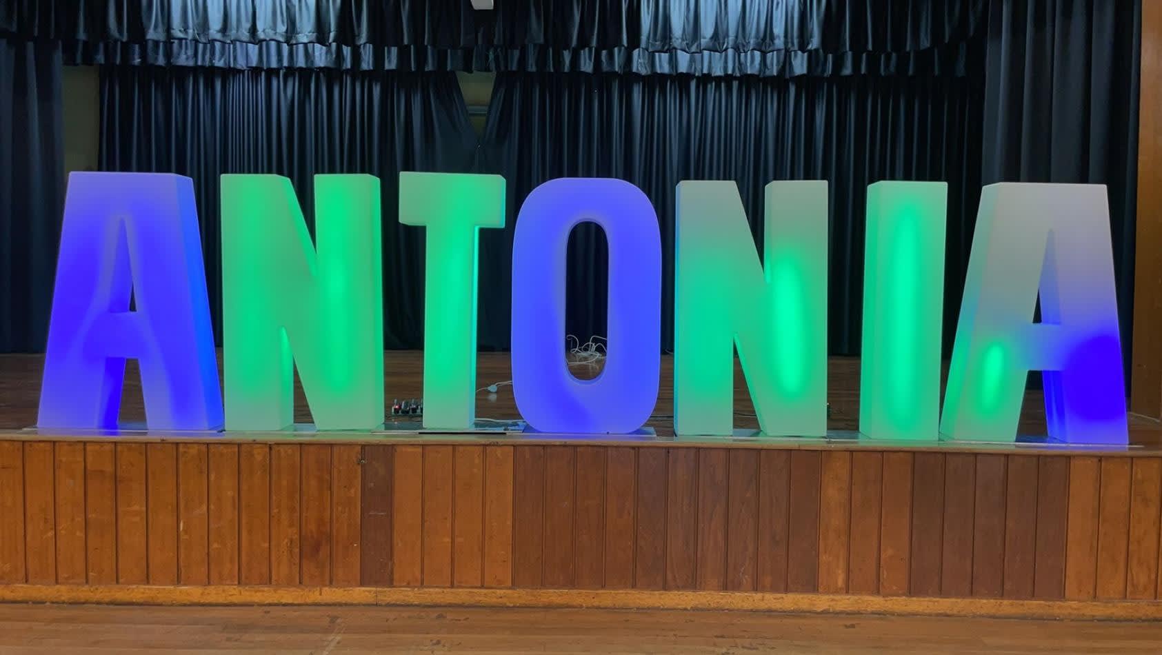 A glow sign with the word Antonia on it