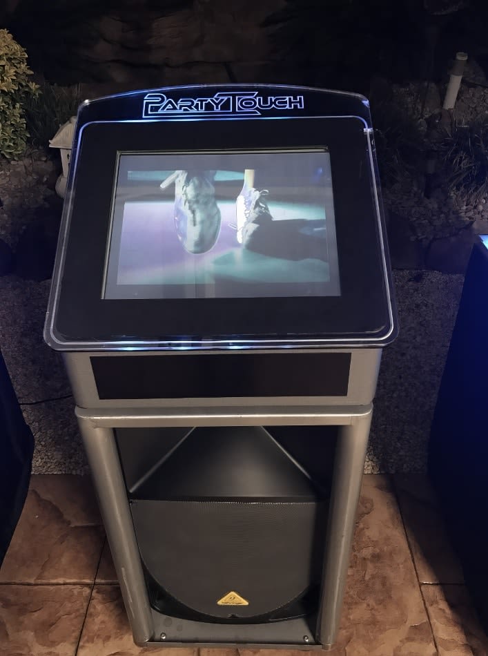 A video game machine with a tv screen on it, perfect for Jukebox Hire Only.