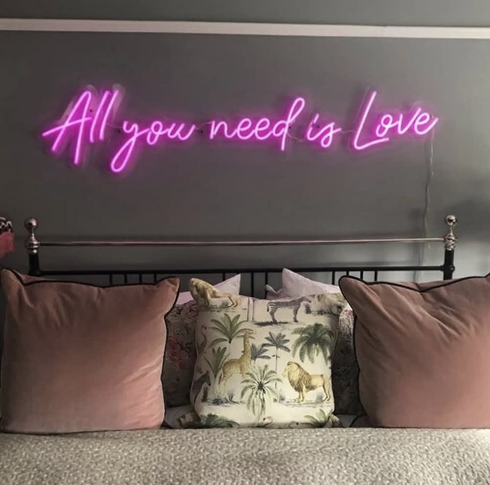 Neon Sign Hire featuring the phrase "All You Need Is Love".