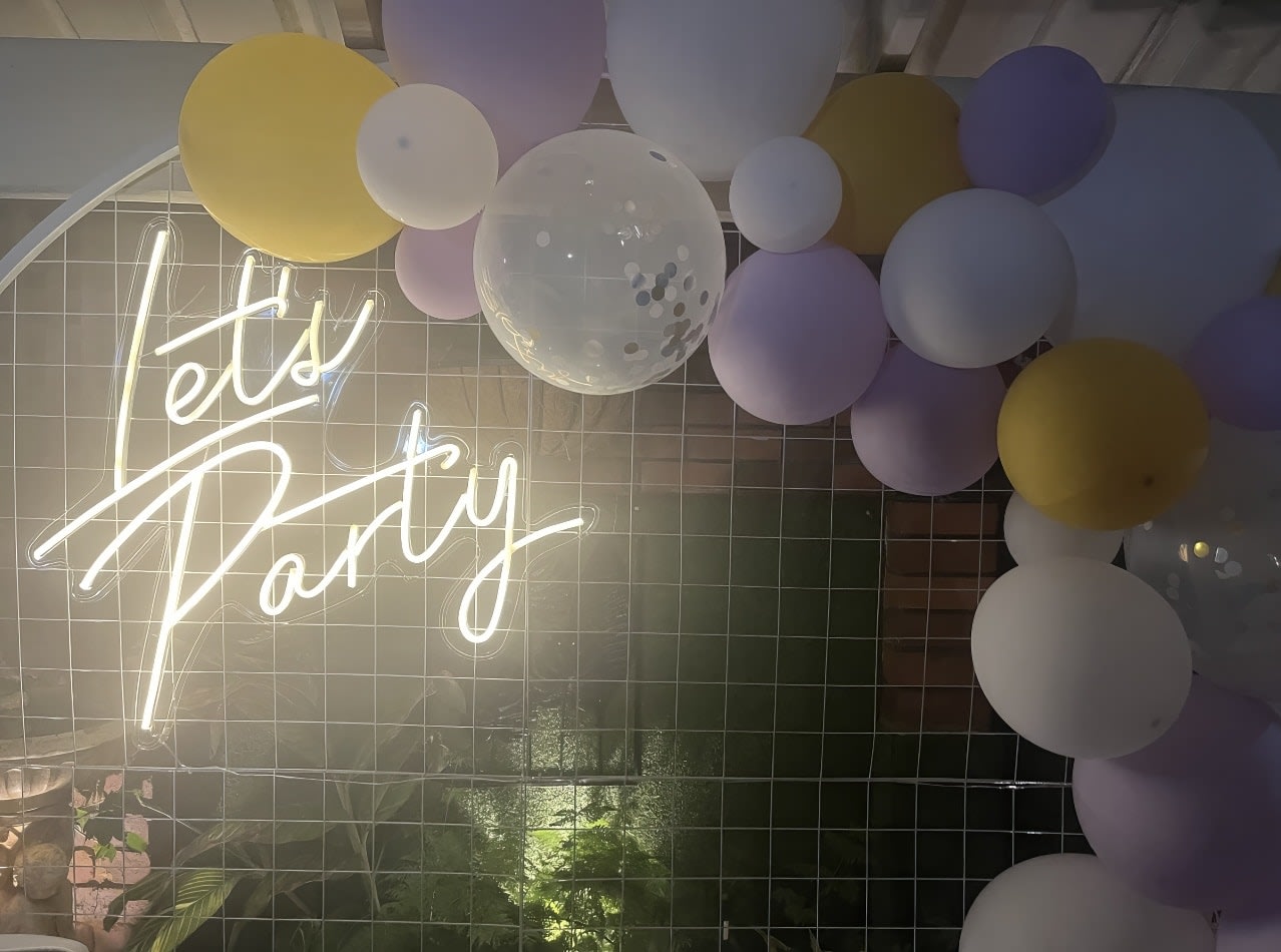 Neon Sign Hire for an Epic Let's Party with Balloon Arch