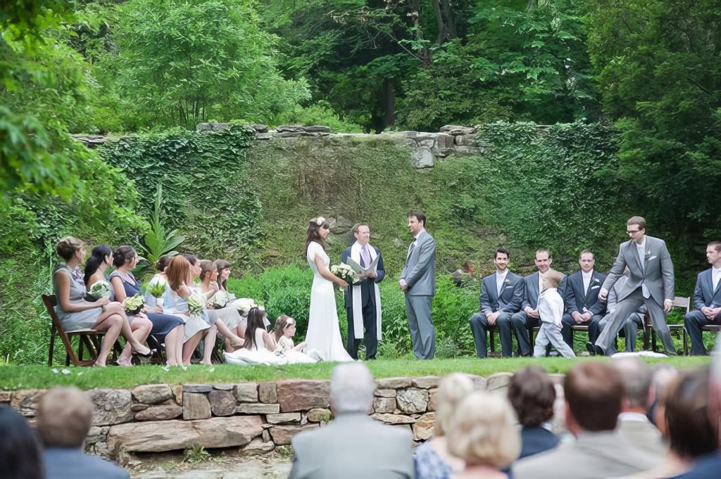Seated bridal party during wedding ceremony