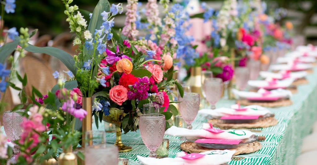 Colourful floral arrangements on wedding table