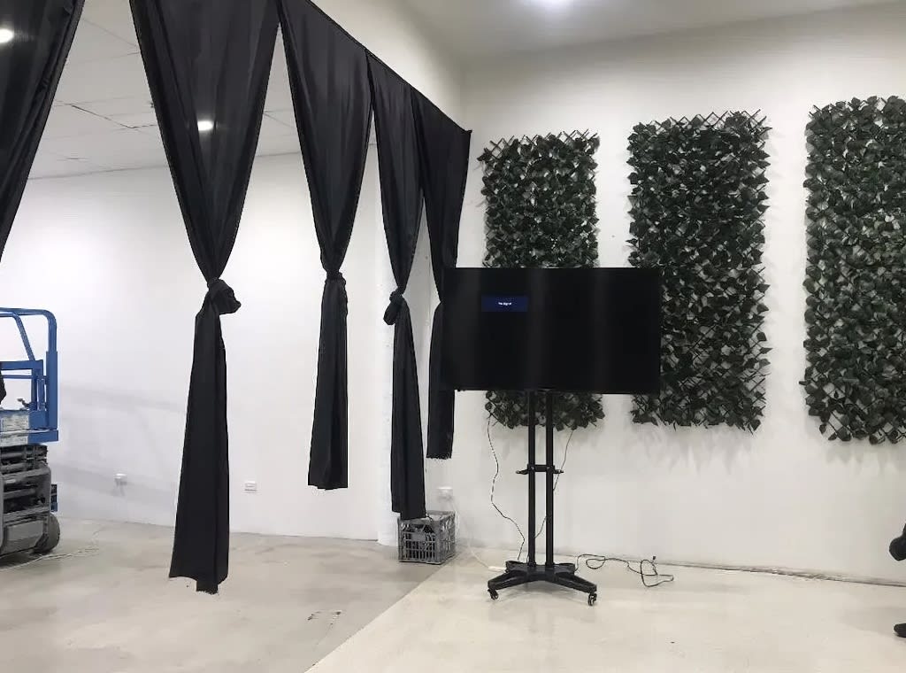 A TV on a stand being hired for a function