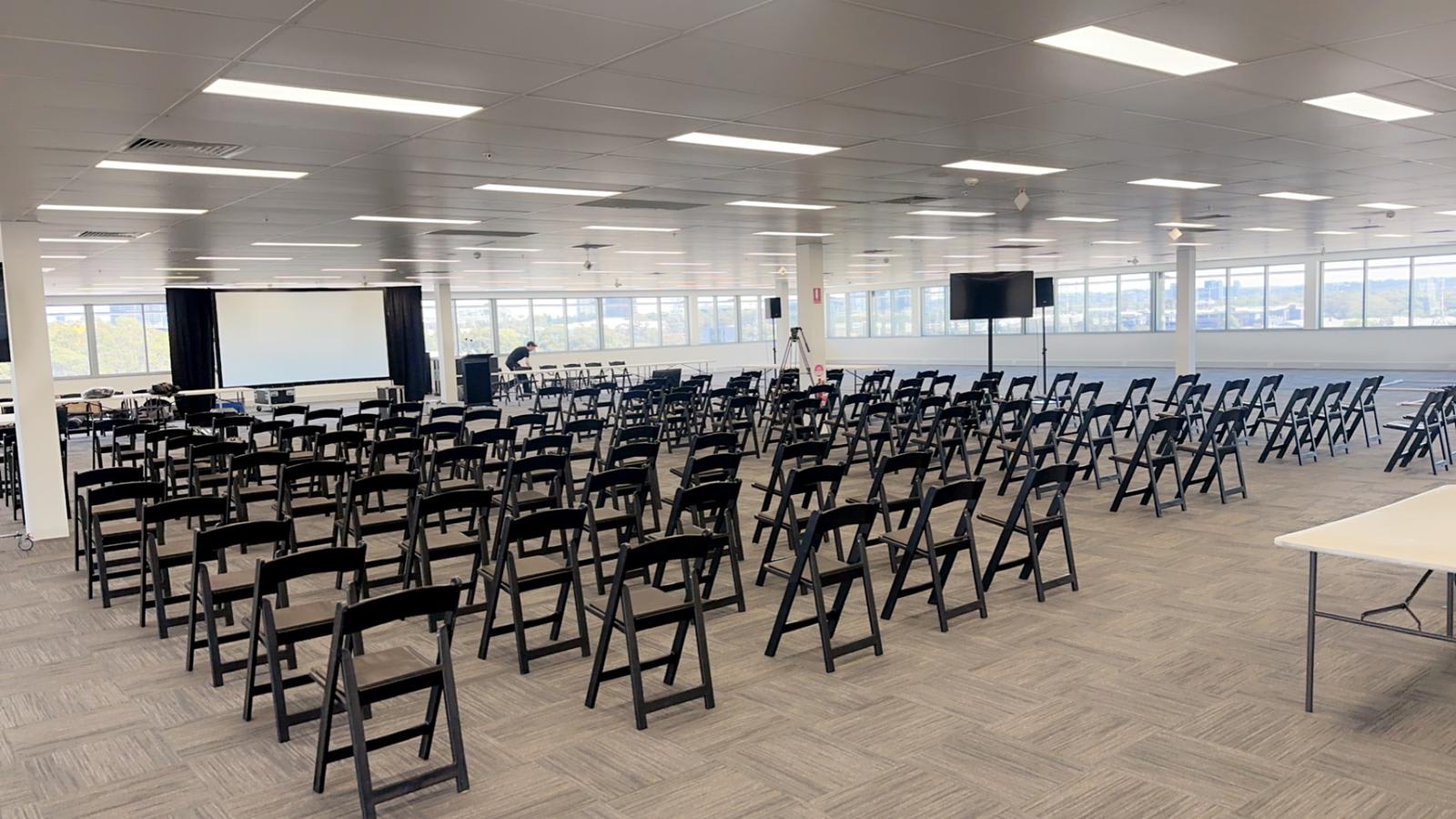 Black Folded Padded chairs in conference