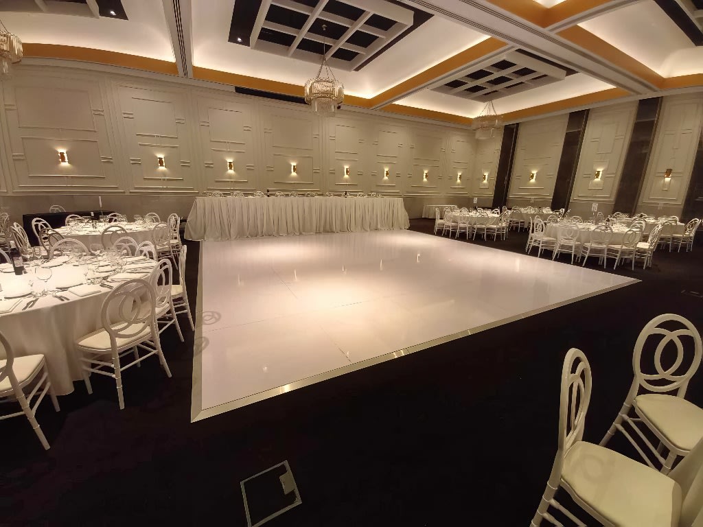 A large white gloss dance floor