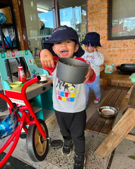 Happy child playing at Playbright childcare Marayong