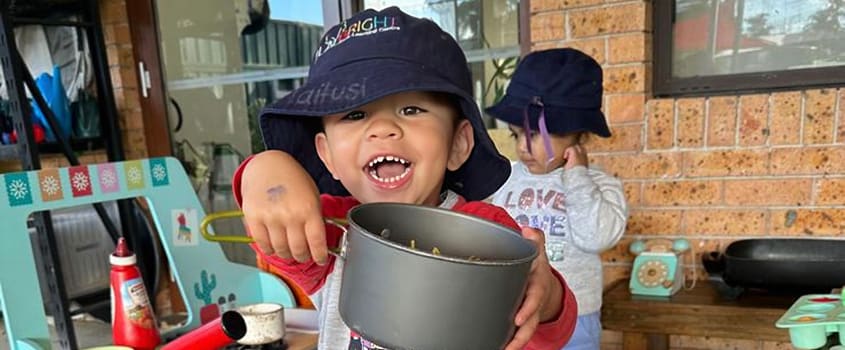 Happy child playing at Playbright childcare Marayong