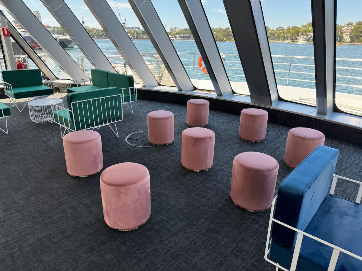 Pink Velvet ottoman Stools Hired for an event on a boat