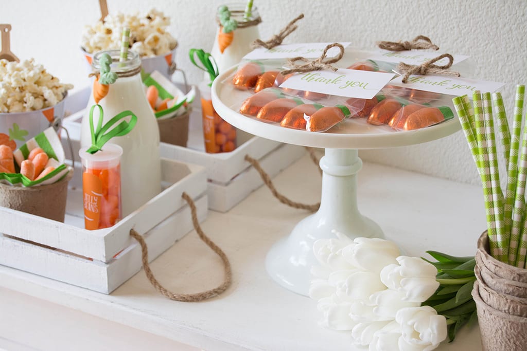 A white cake stand being used for an Easter celebration