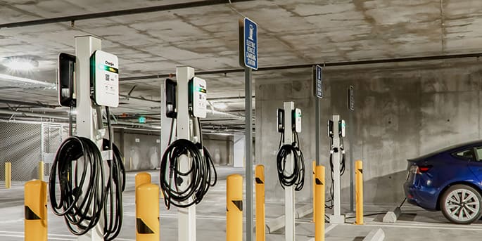 A business car park with a bank of EV chargers