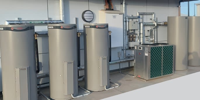 Multiple commercial hot water systems installed in a commercial property