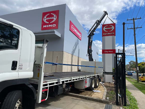 Our crane truck erecting a sign