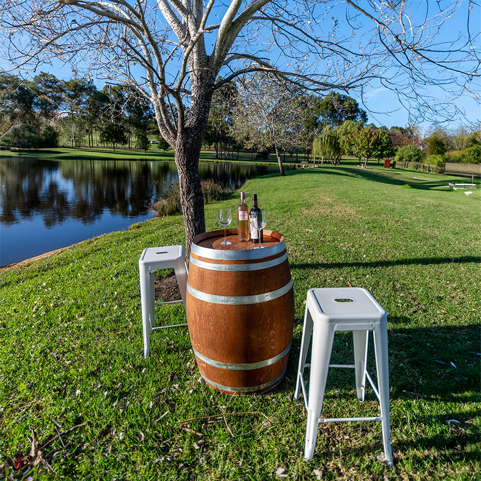 A scenic shot of our wine barrel being hired for an outdoor event