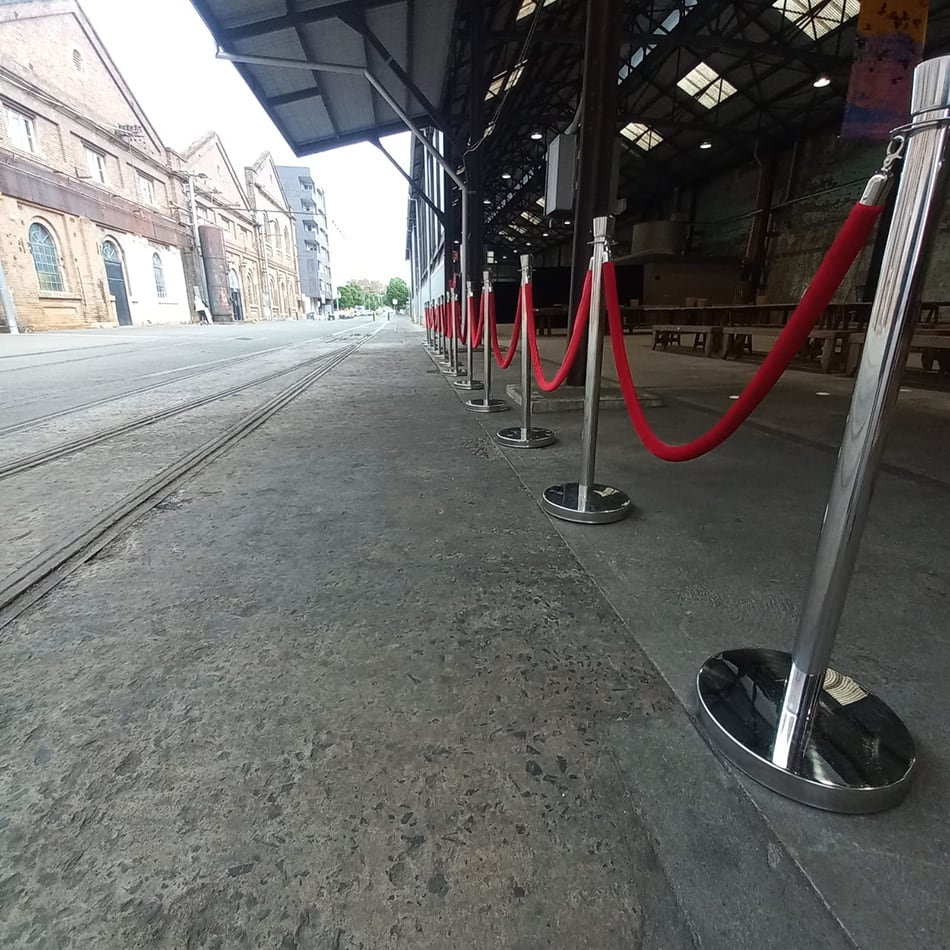 A red velvet rope hired for an outdoor event