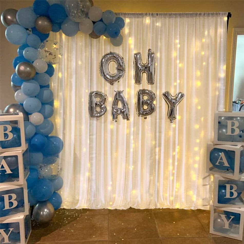 Ou silk white backdrop drapes being used at a baby shower