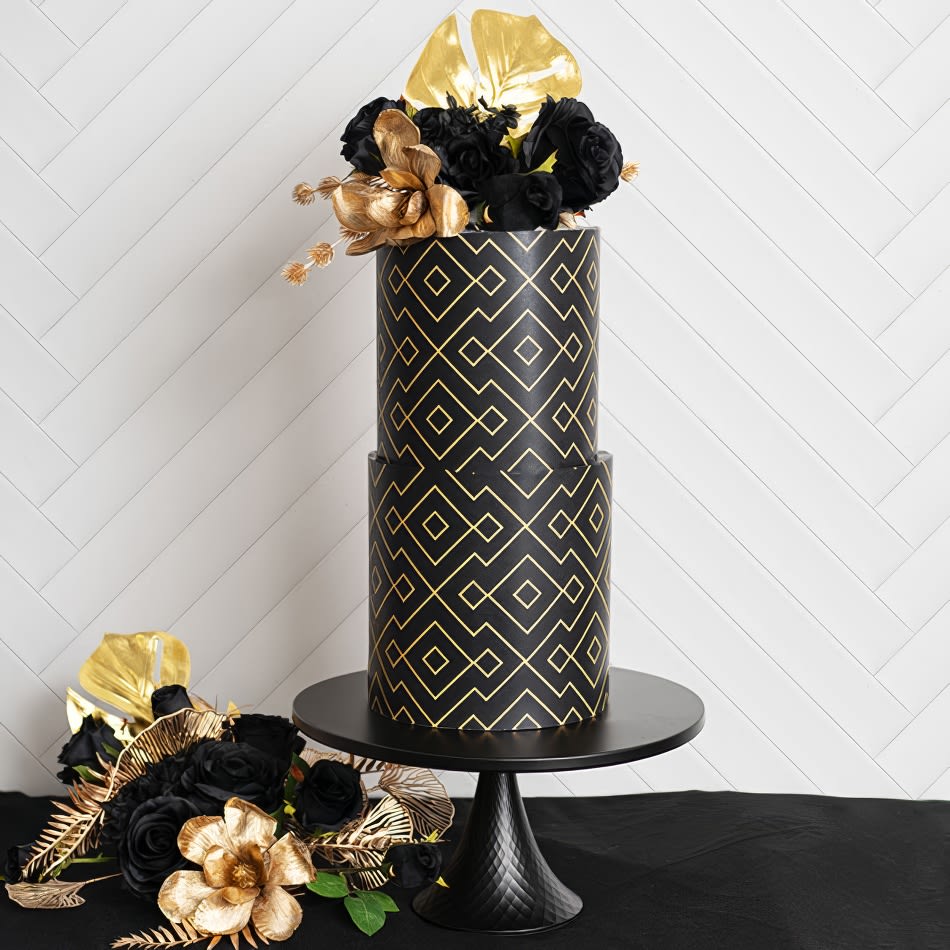 Our black cake stand with decorations on it