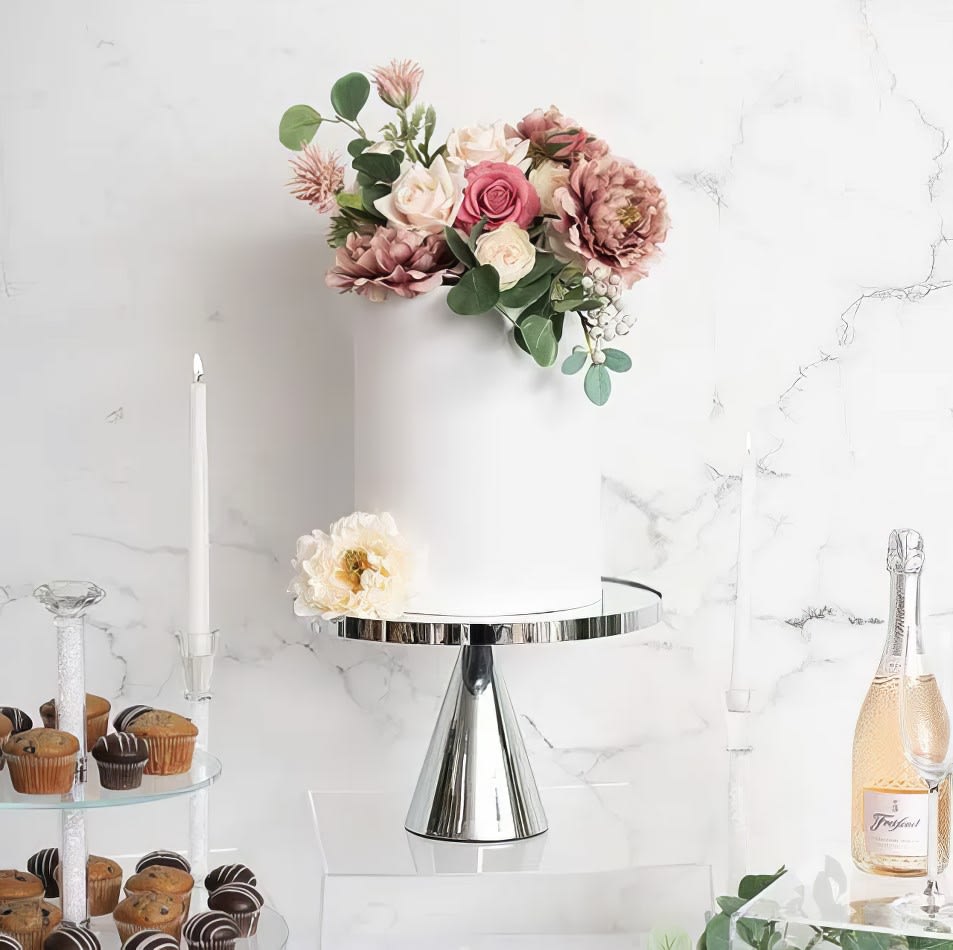 Our silver cake stand with decorations on it