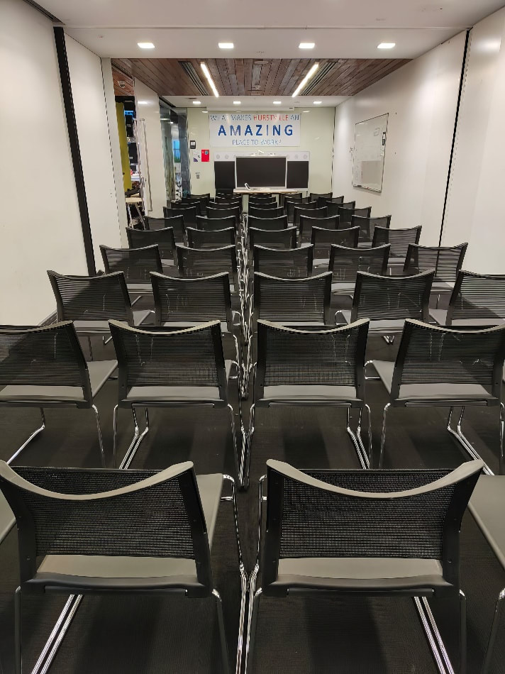 Our conference chairs set up in a room