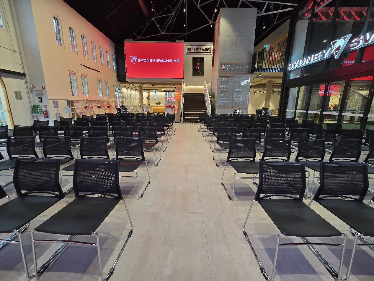 Our conference chairs hired at a car dealership