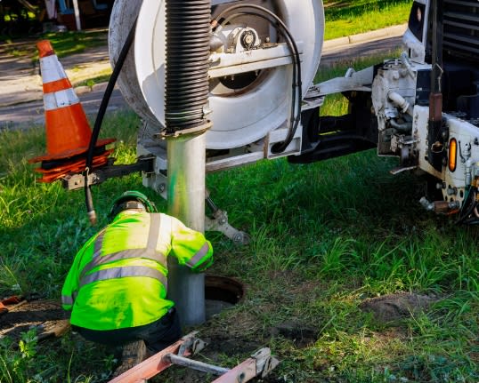 Rams Plumbing & Gas team installing an AES septic system