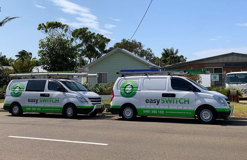 The Easy Switch Electrical vans on a job site
