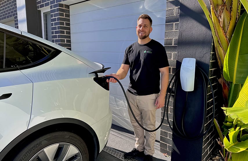 Rick from Easy Switch Electrical testing an EV charger after installation